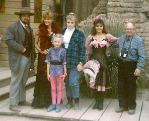 Me, my sister, and our grandpa with people from Old Tucson, AZ